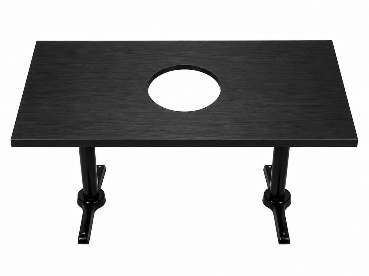 Custom black wood grain Korean BBQ table with center grill cutout and black pedestal legs in Los Angeles