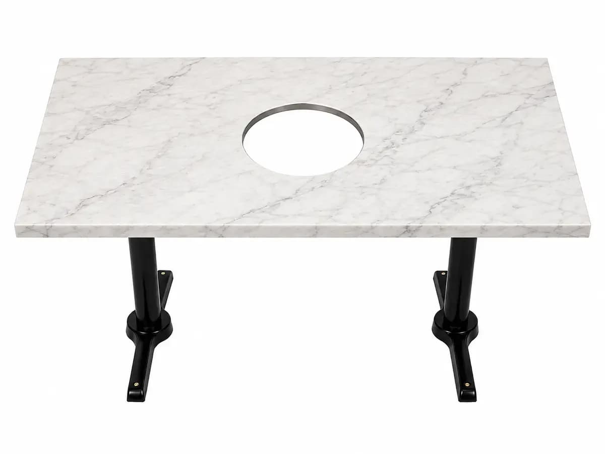 Custom white marble Korean BBQ table with center grill cutout and black pedestal legs in Los Angeles